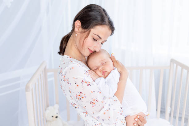 stylish mother wearing a comfortable, breastfeeding-friendly dress