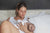 a mother breastfeeding her baby